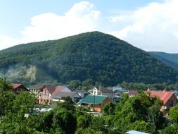 scenic village on the bottom of the mountain