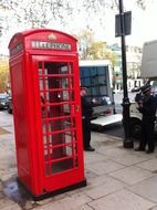 red phone booth on london street