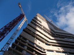 high crane at a construction site in london