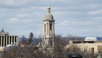 clock tower of old main building of State University at clouds, usa, pennsylvania, University Park