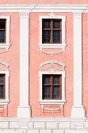 dusky pink facade of the building in Wasserburg