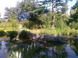 figure of a dinosaur in a park in London