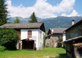 old stone village houses at beautiful mountains, austria, lienz