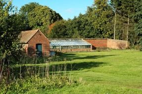 greenhouse and shed in the countryside