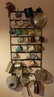 kitchen ware on wall hanging holder