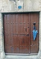 hanging umbrella on the door