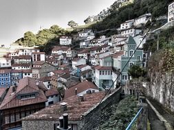scenic old houses on mountain side, spain, asturias, cudillero