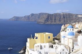 white buildings on the sea coast in Santorini, Greece