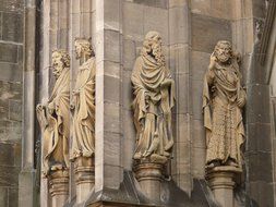 münster figures on a building