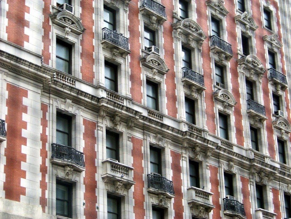 facade of a building with french balconies in New York