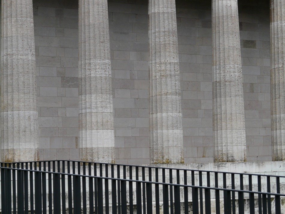 railing near the house with columns