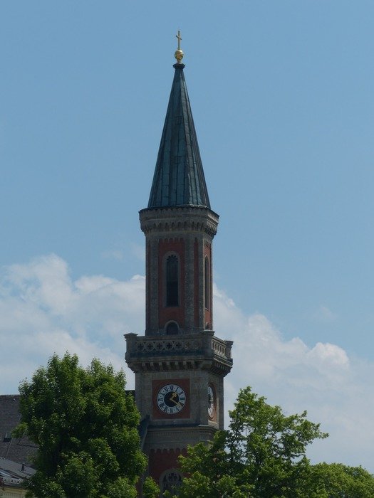 Tower with the spire of the Evangelical Church of Christ