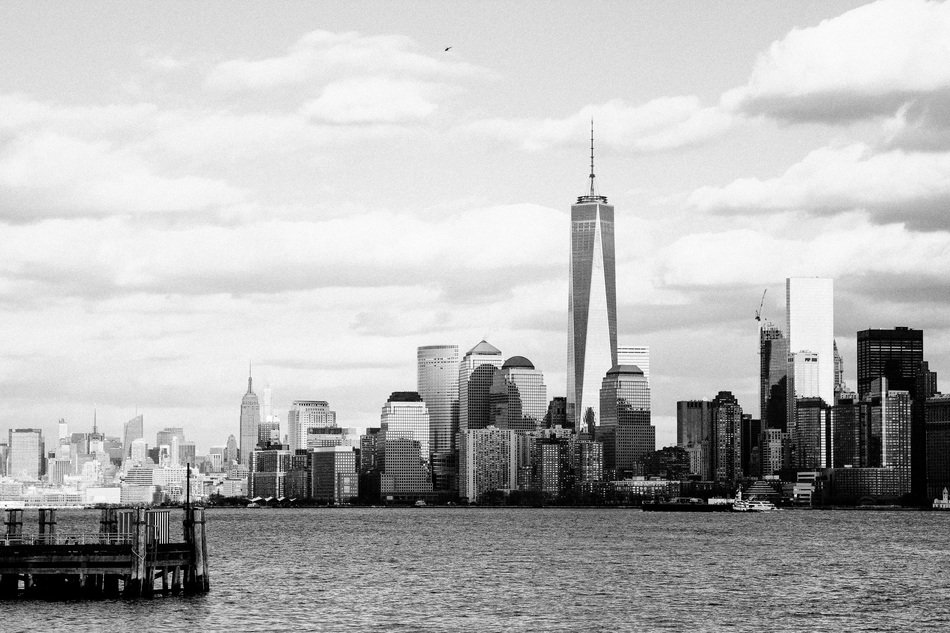 Black and white image of skyscrapers of New York near the water