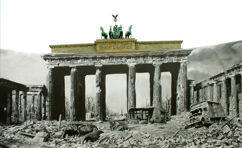 black and white photo of the ruins and the Brandenburg Gate in Berlin