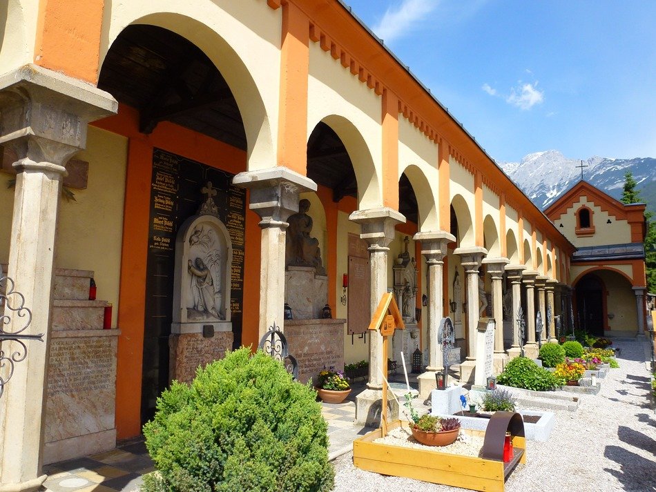 graves in the courtyard of a church in Austria