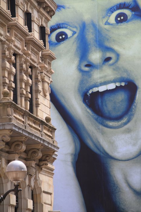 building on the background of the head of a man in fear