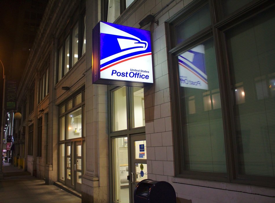 night illumination of a post office in the USA