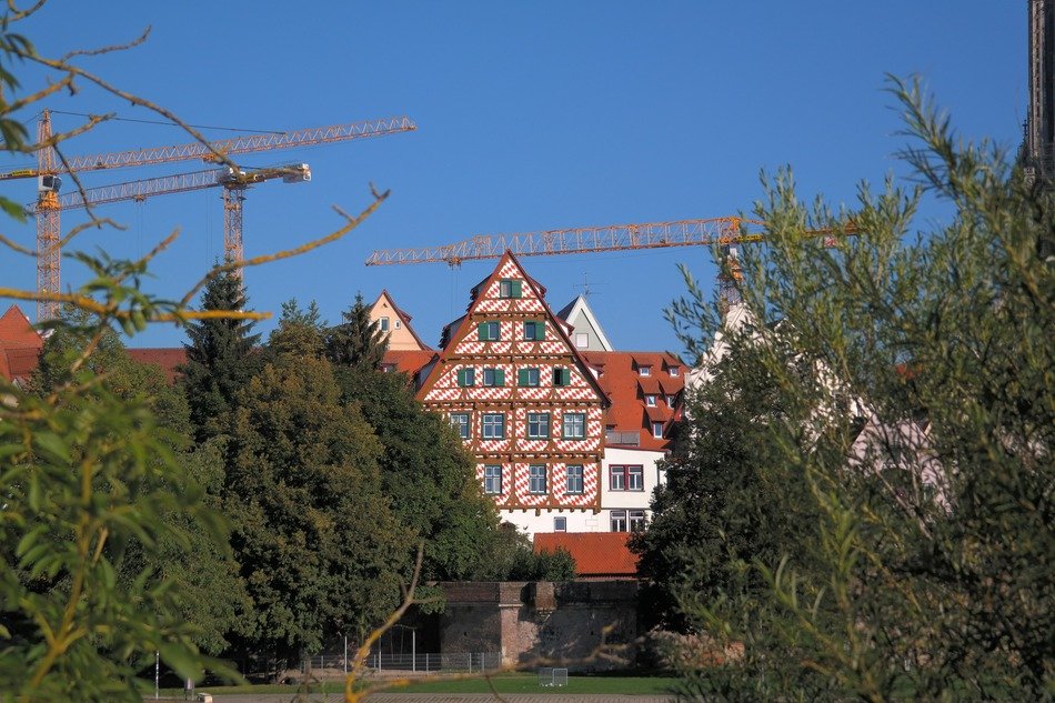 Construction cranes over the old city