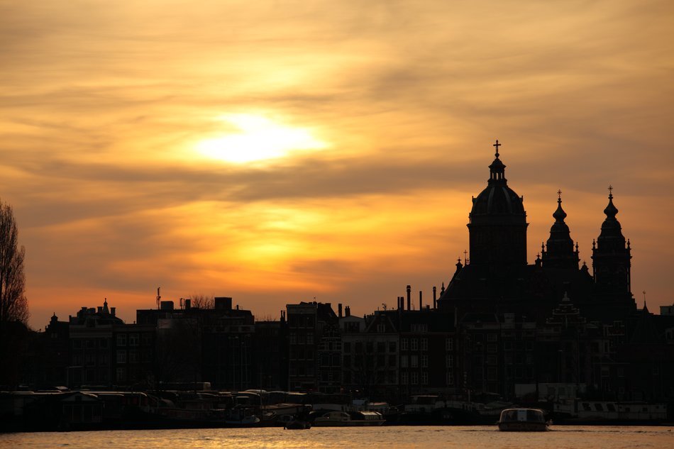 silhouette of amsterdam at sunset