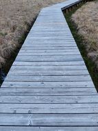 wood flooring on the sandy beach