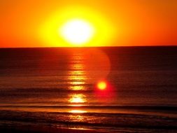 Sunrise on the water in summer