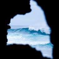 view through a stone hole in the ocean