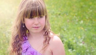 Little girl with long curly hair