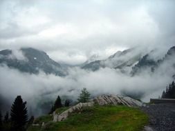 alps in thick clouds