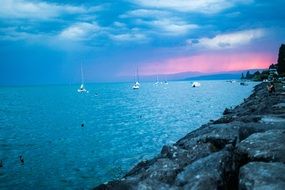 sunset sailboats