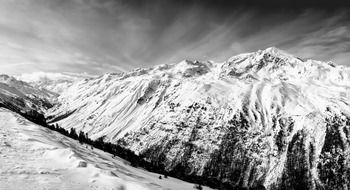 black and white panorama of snowy mountains