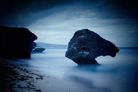 cliffs on the coast of barbados in the darkness