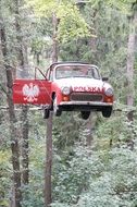 Picture of vehicle flying in a forest