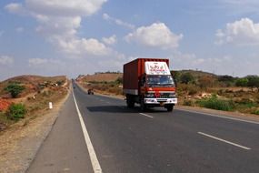 red truck on highway in India