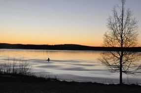 idyllic sunset over a pond