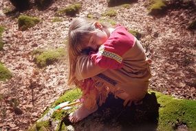 girl sitting relaxed with closed eyes
