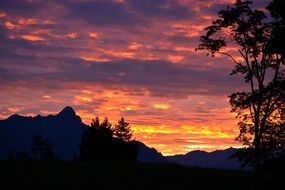 orang sunrise morning mountain outlines