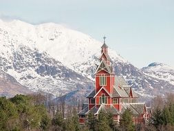 red church in the mountain