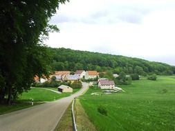 village on the green hills of bavaria