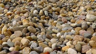 pebbles on a sea bank