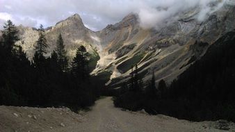 dolomites in italy with green trees