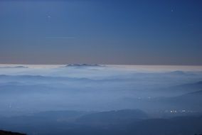 mountain tops in the fog