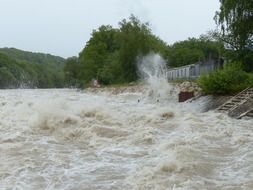 high water, wave splashing on beach