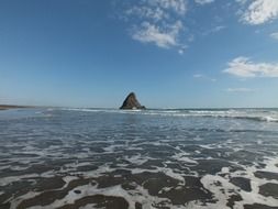 rock in the warm ocean