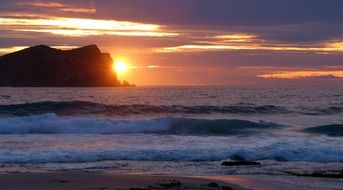 waves on a sea at the sunset
