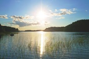 The bright sun over the lake