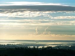white clouds over the horizon