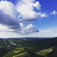 white clouds over picturesque landscapes in italy