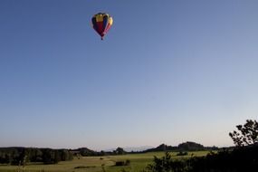 Gas filled balloon in a sky