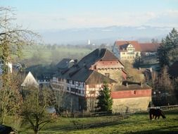 panorama of castle hagenwil on the water