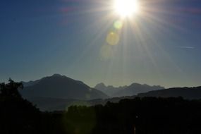 sunshine over Swiss mountains